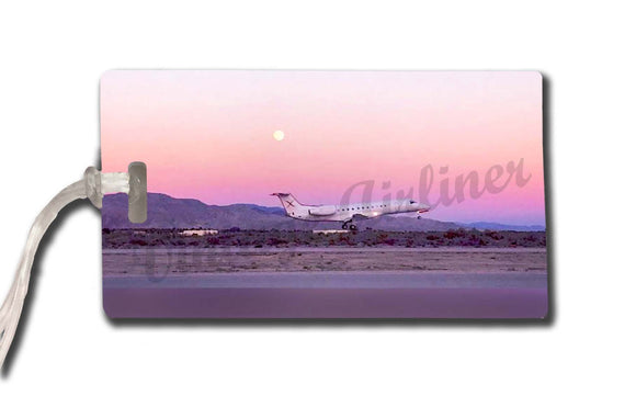 JSX plane landing at dusk bag tag