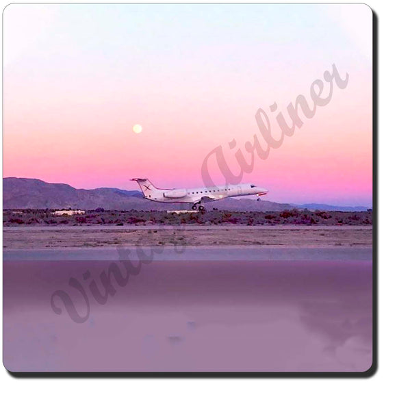 JSX plane landing at dusk coaster
