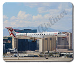 JSX plane landing in Las Vegas mousepad